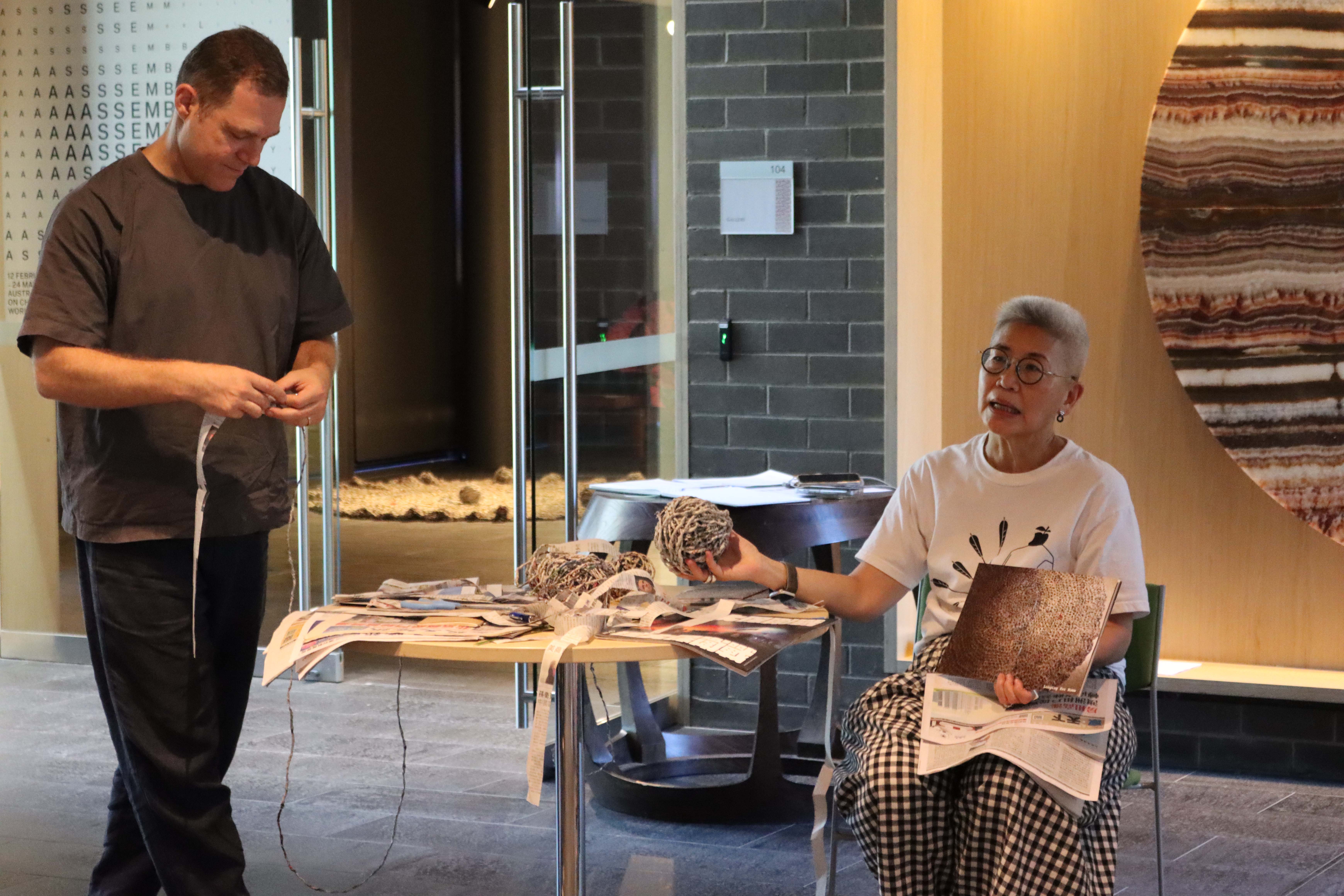 Pamela Showing How To Make Newspaper Into Yarn