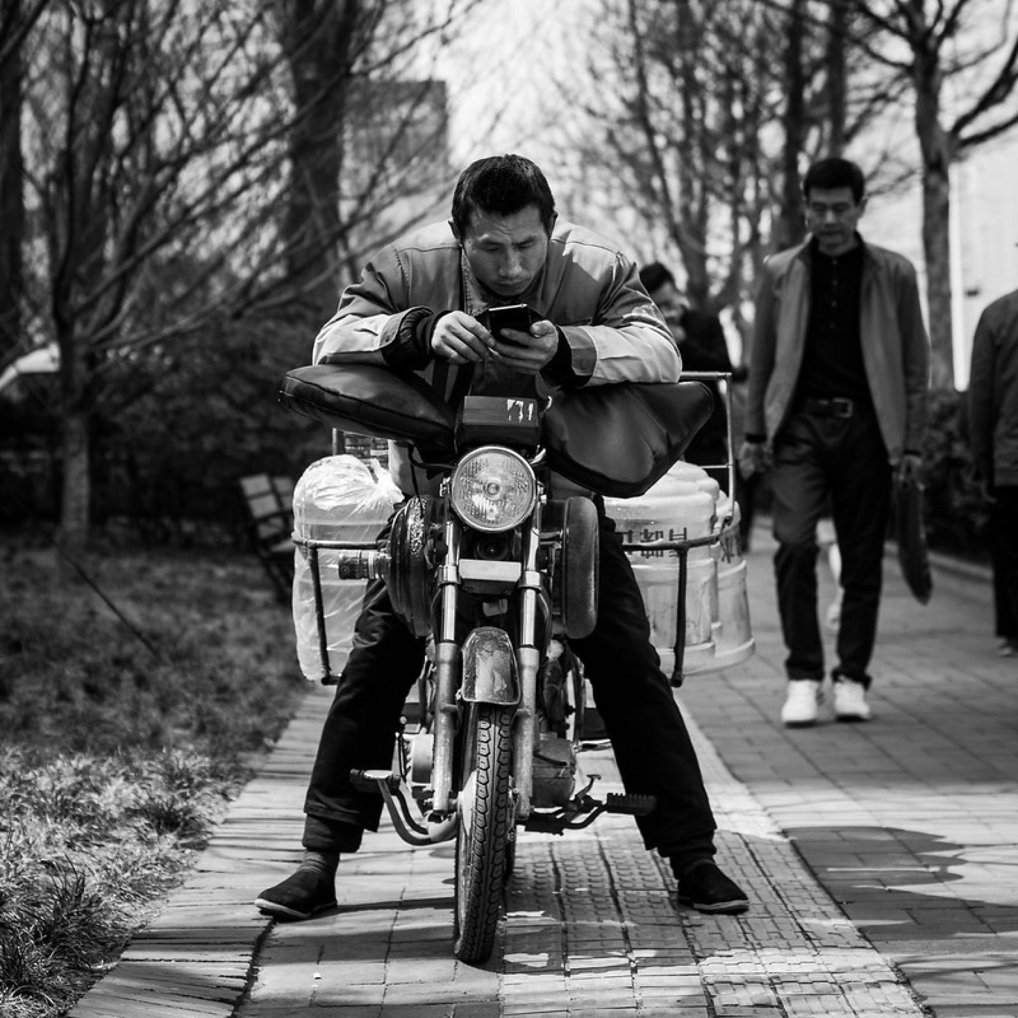 reading on a motorbike