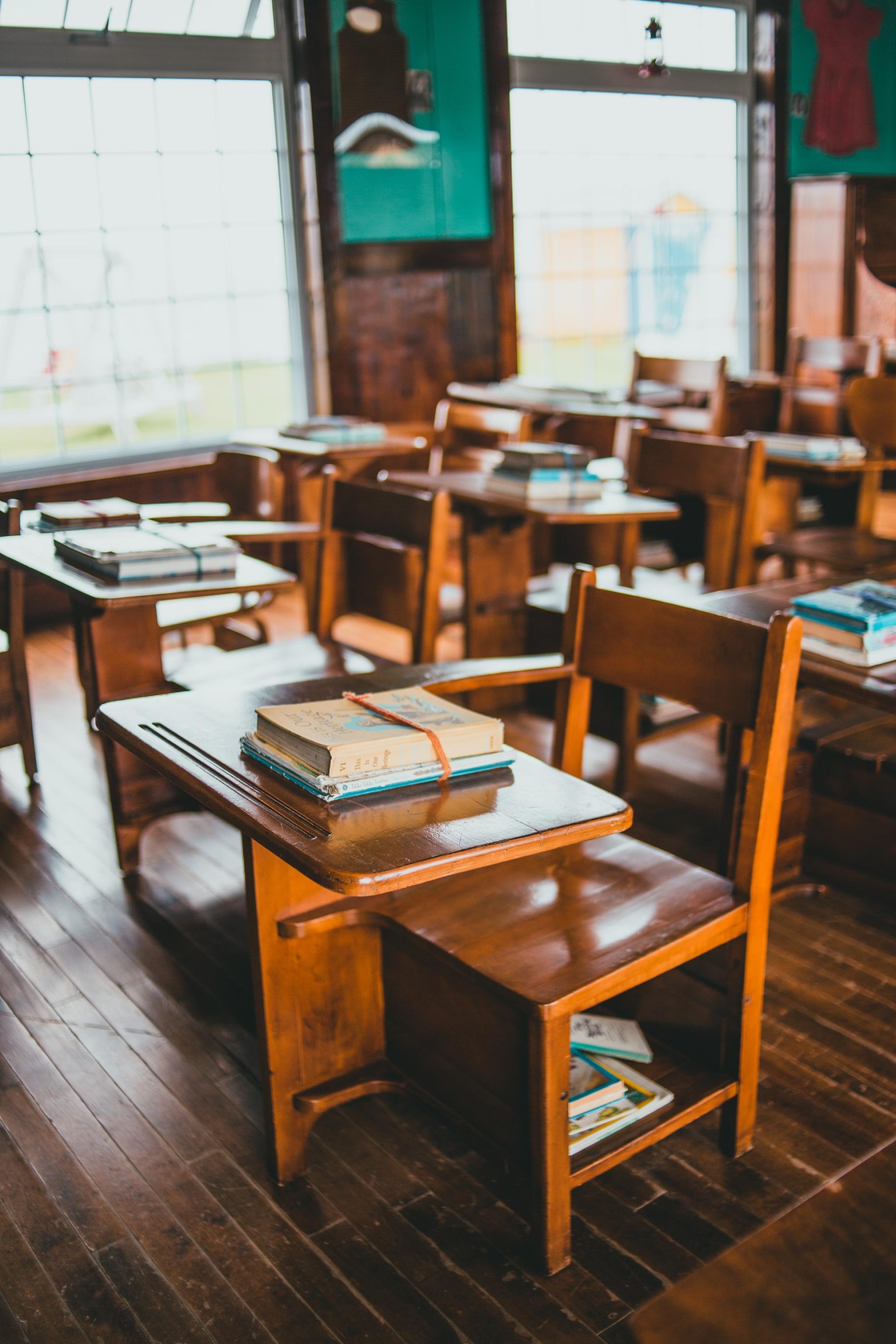 table and chair and books