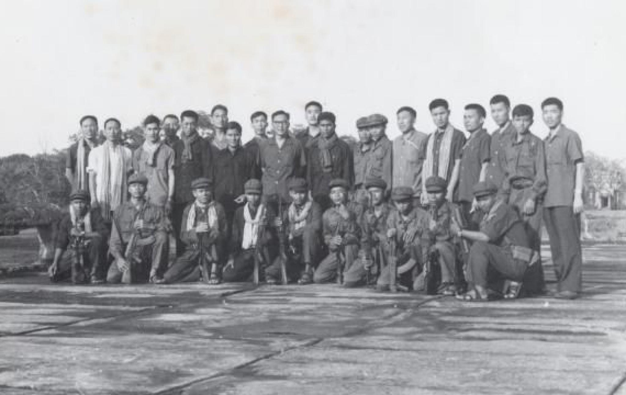 Photo of CCP officials with Khmer Rouge cadres in front of Angkor Wat. (Courtesy Documentation Center of Cambodia, Phnom Penh).