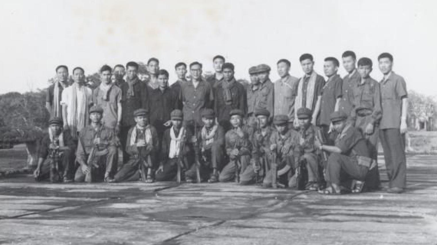 Photo of CCP officials with Khmer Rouge cadres in front of Angkor Wat. (Courtesy Documentation Center of Cambodia, Phnom Penh).